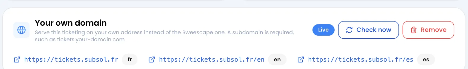 Tarjeta Your own domain con la insignia Live y los botones Check now y Remove, con https://tickets.subsol.fr en idioma fr, https://tickets.subsol.fr/en en en y https://tickets.subsol.fr/es en es